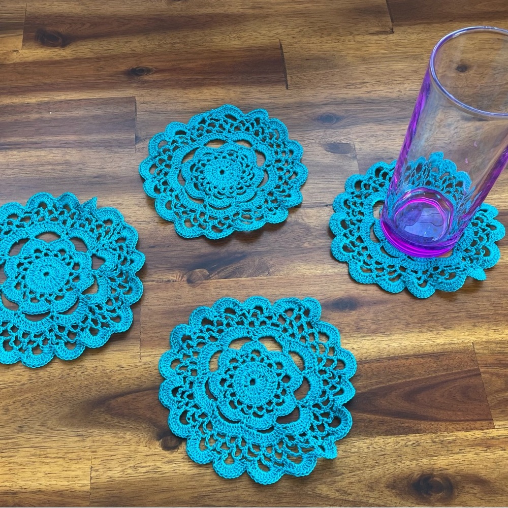 Set of four hand crocheted coasters